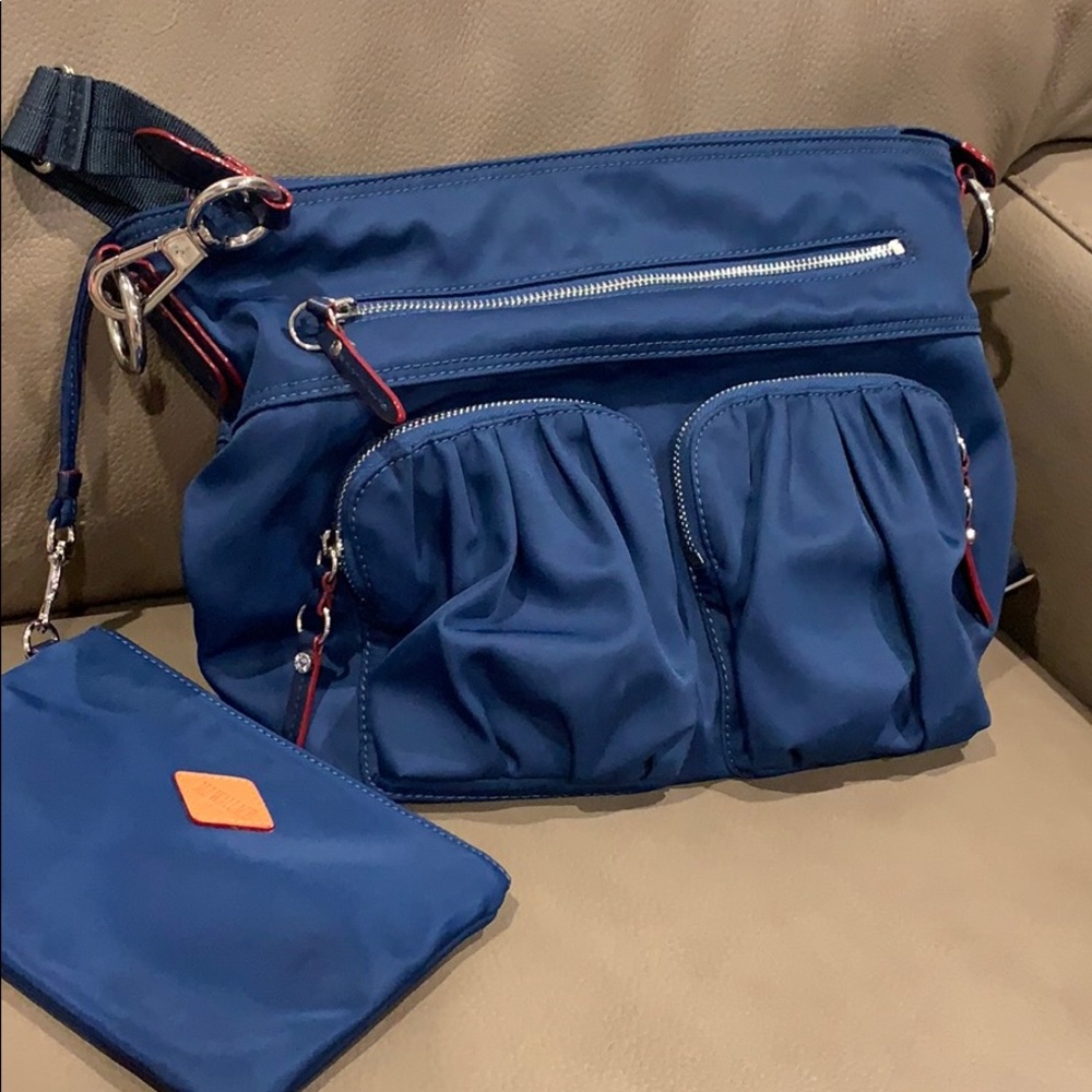 Fabrication: Nylon
Trim: Italian leather